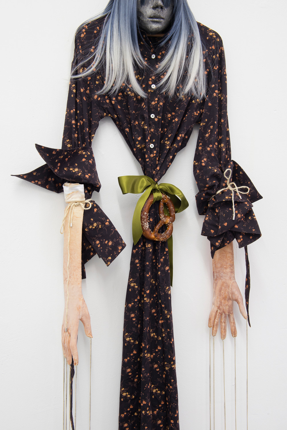 Witch (details), 2020, latex, textile, wig, bretzel, rope, chains, circa 188 x 54 x 15 cm — © Manon Wertenbroek